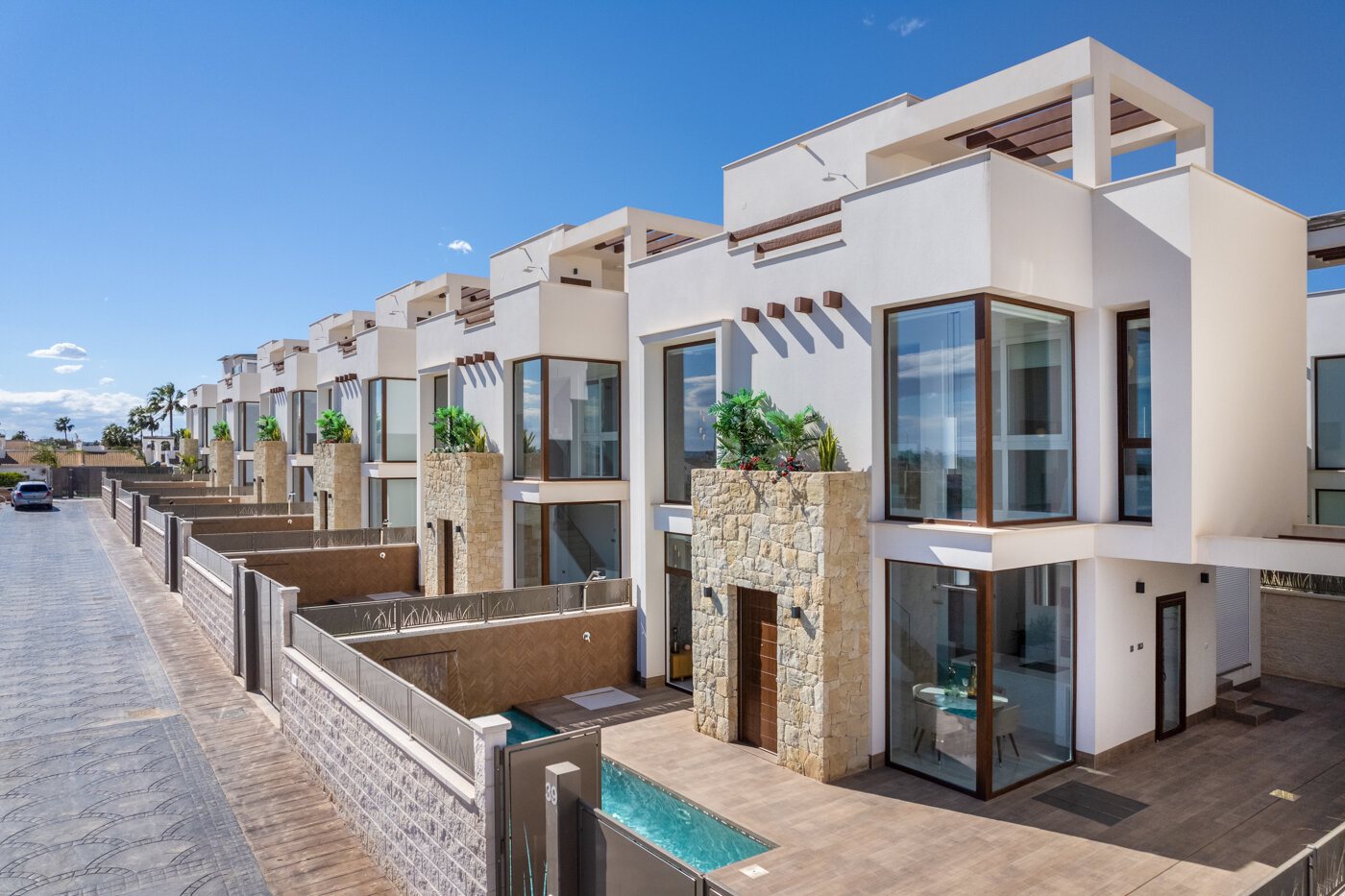 Key-Ready Pool Villa with Basement – row of villas with pools